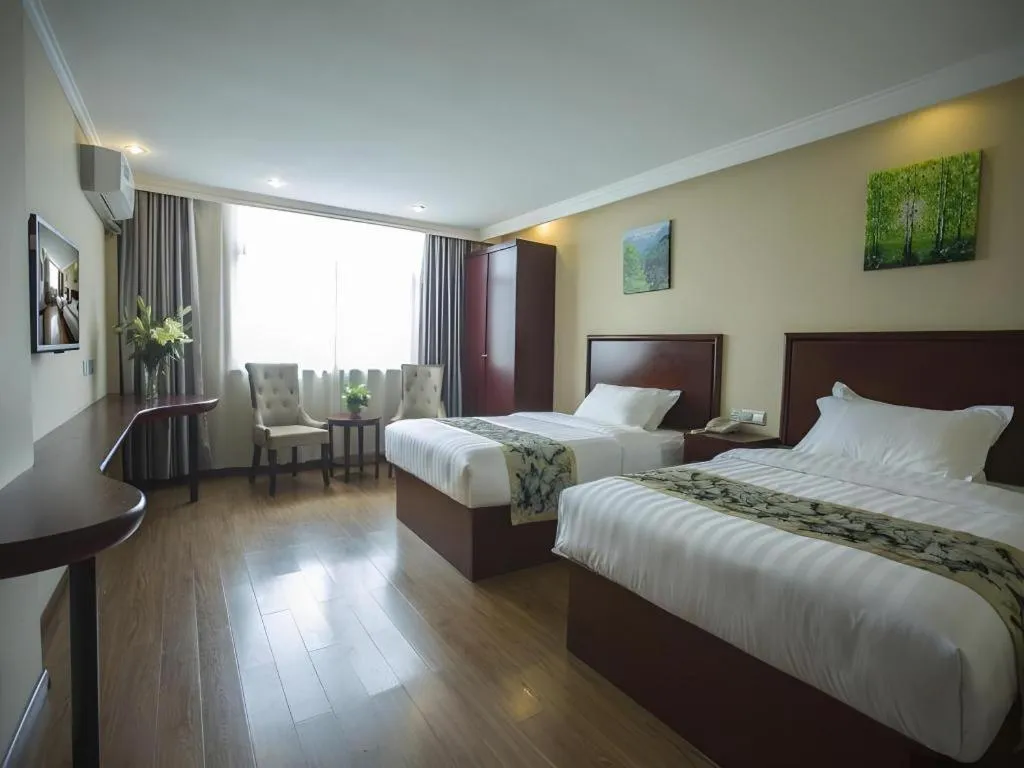Bed in GreenTree Inn Taizhou Gaogang District Business Hotel