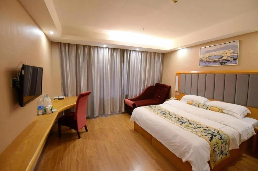 Bed in GreenTree Inn Taizhou Gaogang District Business Hotel