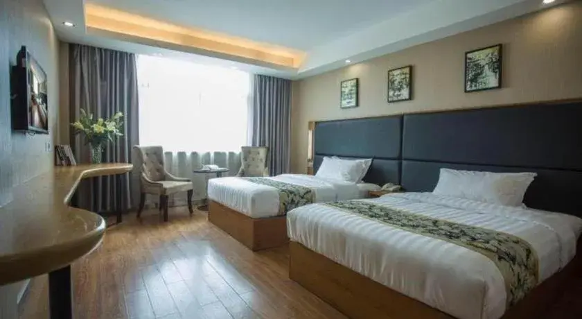Bed in GreenTree Inn Taizhou Gaogang District Business Hotel Bed in GreenTree Inn Taizhou Gaogang District Business Hotel