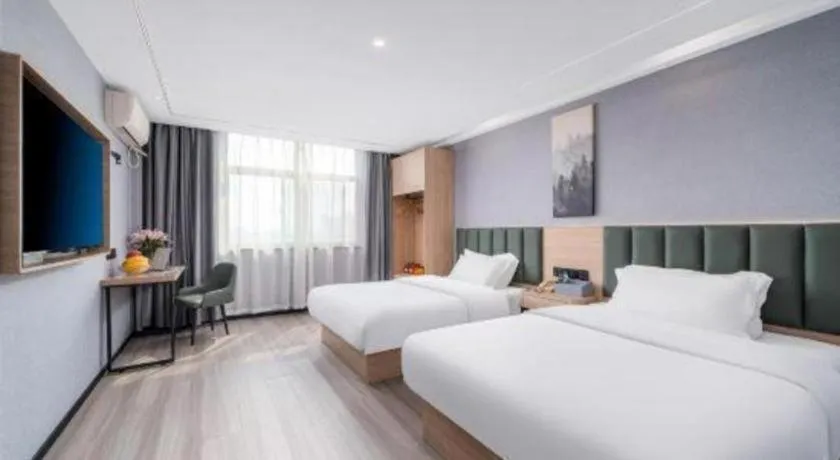 Bed in GreenTree Inn Taizhou Gaogang District Business Hotel