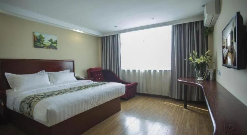 Bed in GreenTree Inn Taizhou Gaogang District Business Hotel
