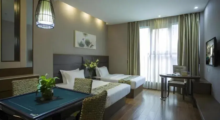 Bed in GreenTree Inn Taizhou Gaogang District Business Hotel Bed in GreenTree Inn Taizhou Gaogang District Business Hotel