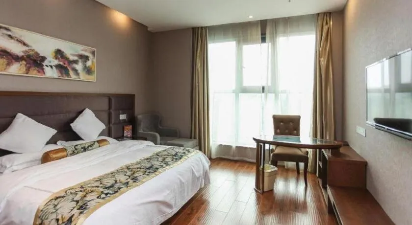 Bed in GreenTree Inn Taizhou Gaogang District Business Hotel