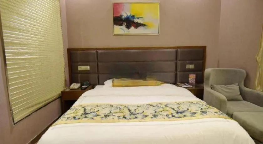 Bed in GreenTree Inn Taizhou Gaogang District Business Hotel