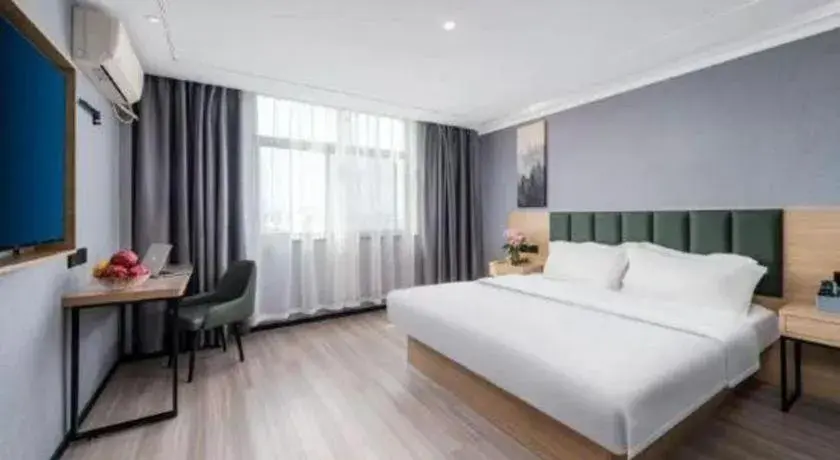 Bed in GreenTree Inn Taizhou Gaogang District Business Hotel Bed in GreenTree Inn Taizhou Gaogang District Business Hotel