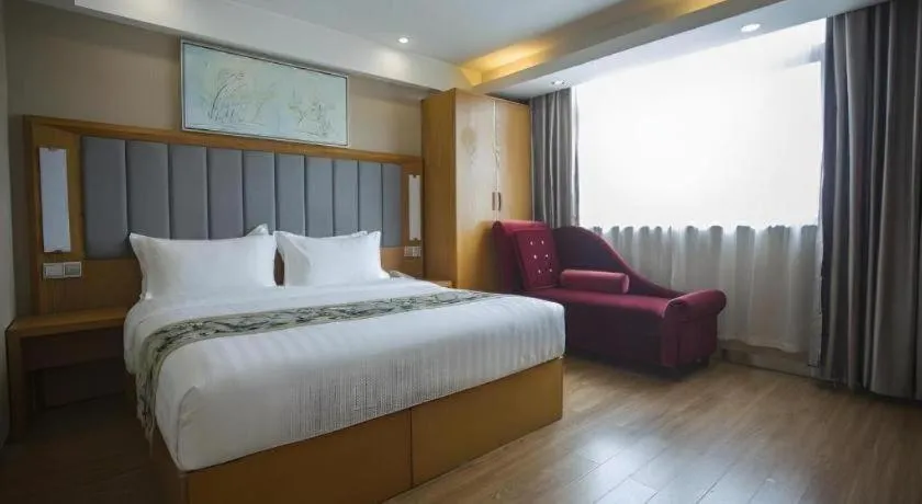 Bed in GreenTree Inn Taizhou Gaogang District Business Hotel