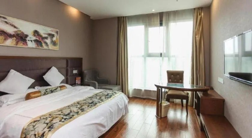 Bed in GreenTree Inn Taizhou Gaogang District Business Hotel