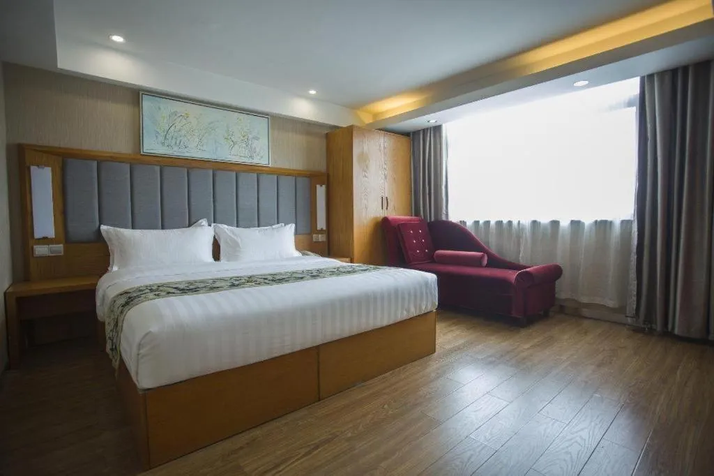 Bed in GreenTree Inn Taizhou Gaogang District Business Hotel