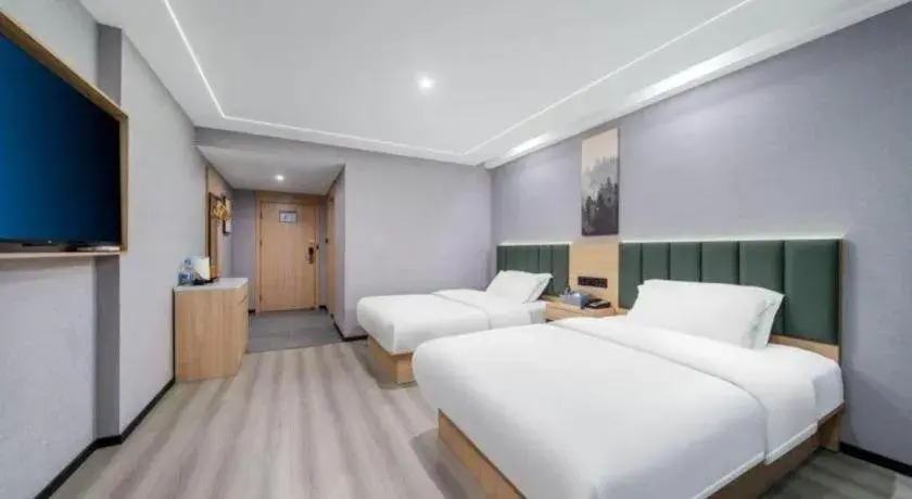 Bed in GreenTree Inn Taizhou Gaogang District Business Hotel Bed in GreenTree Inn Taizhou Gaogang District Business Hotel