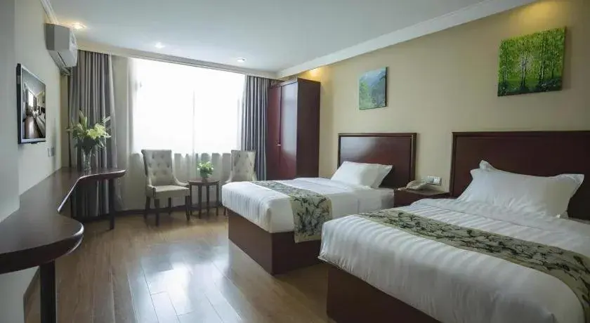 Bed in GreenTree Inn Taizhou Gaogang District Business Hotel Bed in GreenTree Inn Taizhou Gaogang District Business Hotel