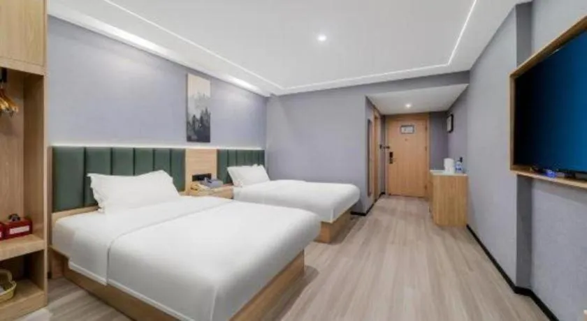 Bed in GreenTree Inn Taizhou Gaogang District Business Hotel