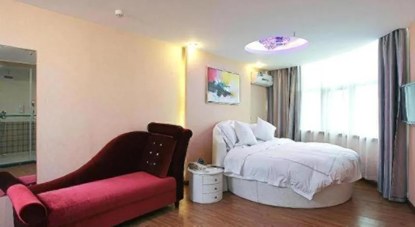 Bed in GreenTree Inn Taizhou Gaogang District Business Hotel