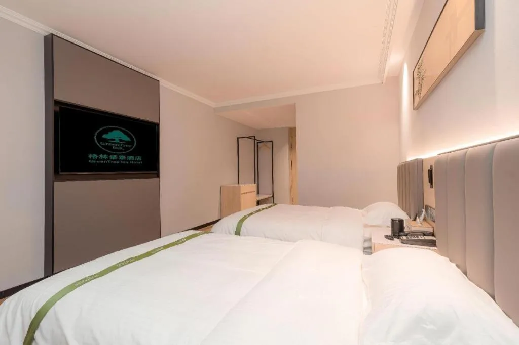 Bed in GreenTree Inn xinghua Middle Yingwu Road Express Hotel