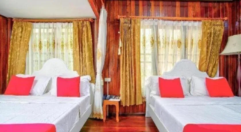 Bed in Thaiasia Goldensea Resort