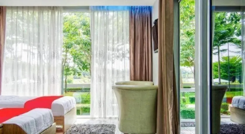 Bed in Thaiasia Goldensea Resort