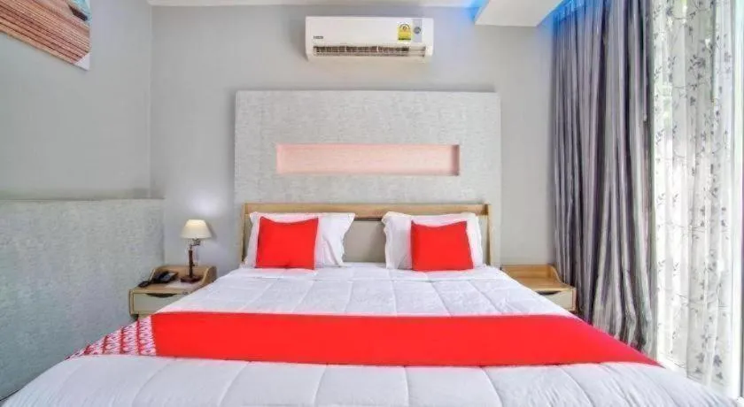 Bed in Thaiasia Goldensea Resort