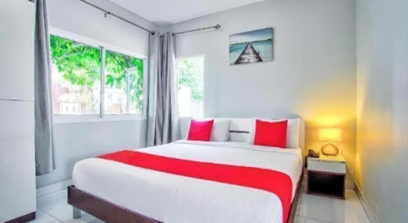 Bed in Thaiasia Goldensea Resort