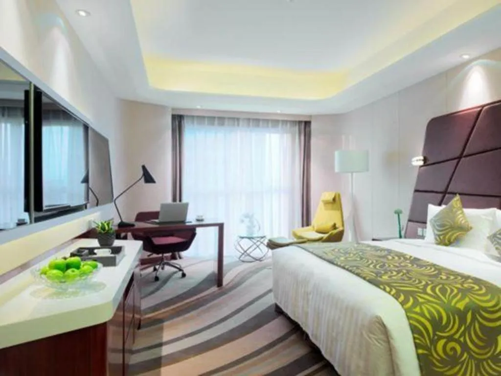 Bed in Hotel Maxmelim Beijing