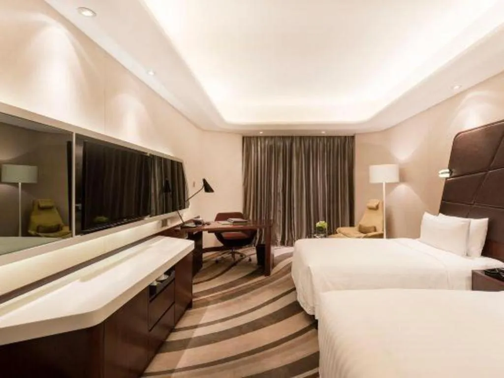 Bed in Hotel Maxmelim Beijing