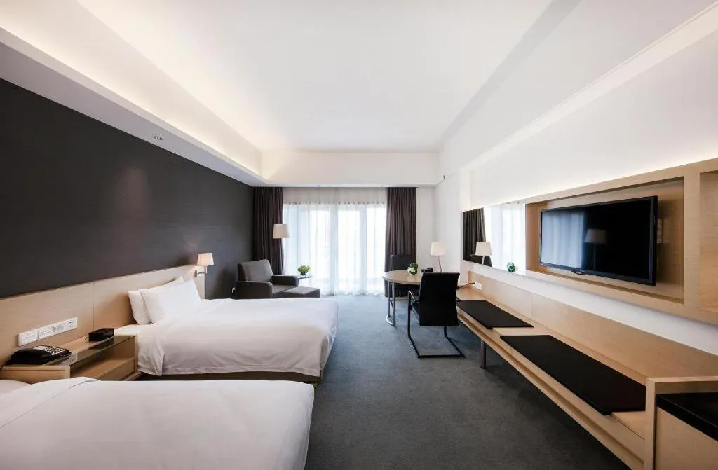 Bed in Hotel Maxmelim Beijing