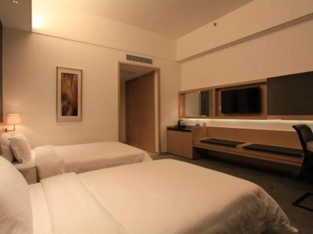 Bed in Hotel Maxmelim Beijing