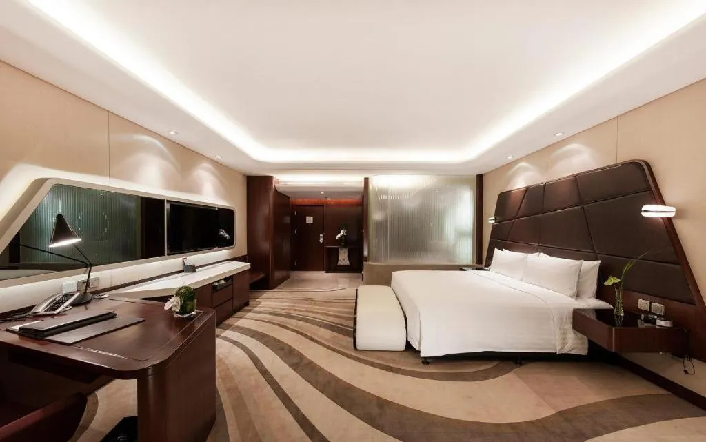 Bed in Hotel Maxmelim Beijing