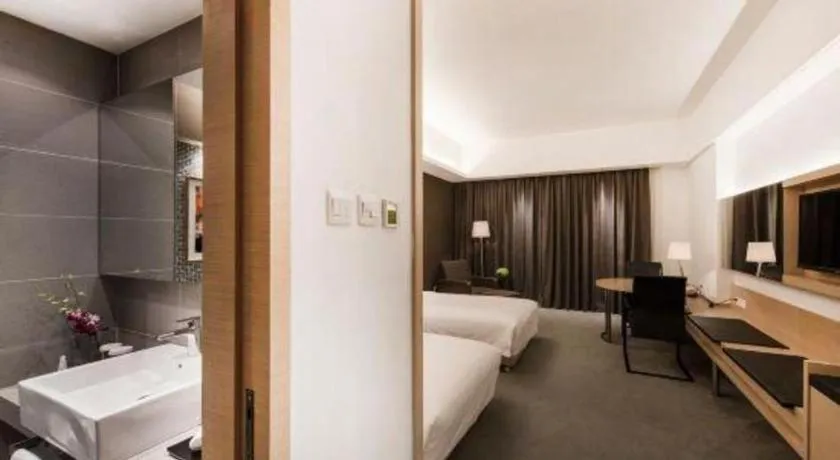 Bed in Hotel Maxmelim Beijing