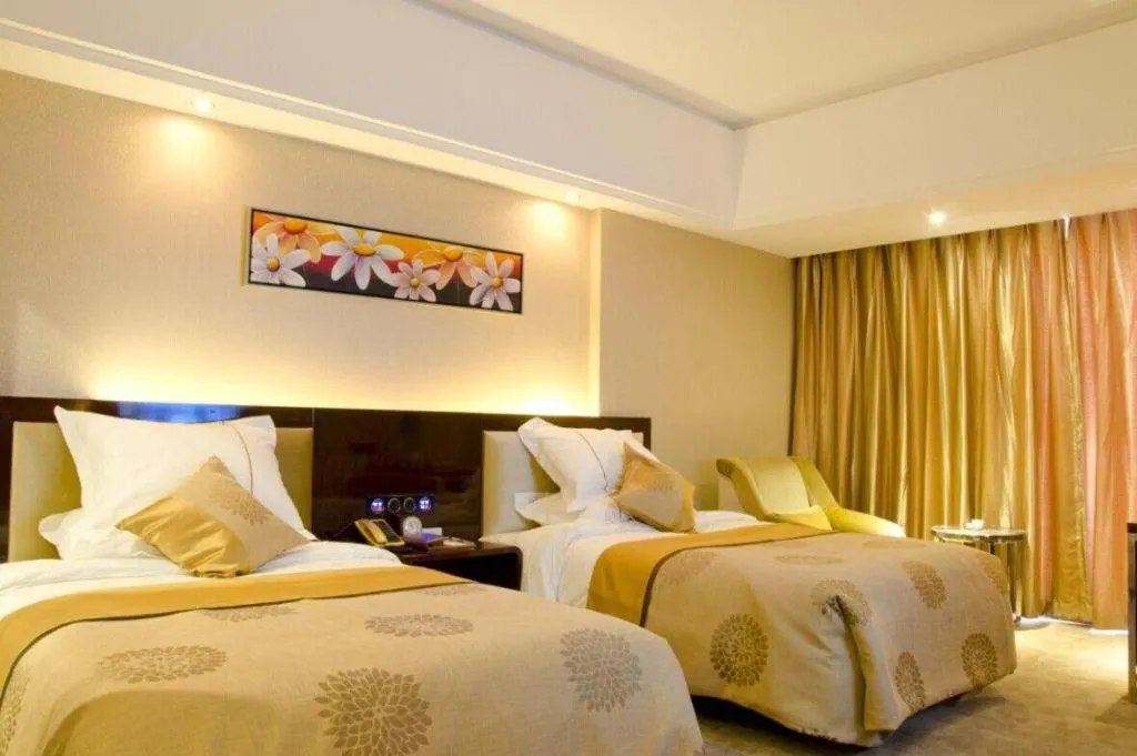 Bed in Xin Sheng Da Hong Sheng International Hotel