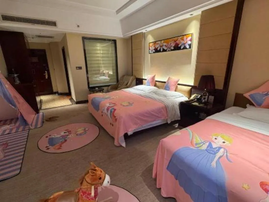 Bed in Xin Sheng Da Hong Sheng International Hotel