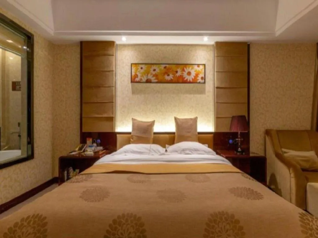 Bed in Xin Sheng Da Hong Sheng International Hotel