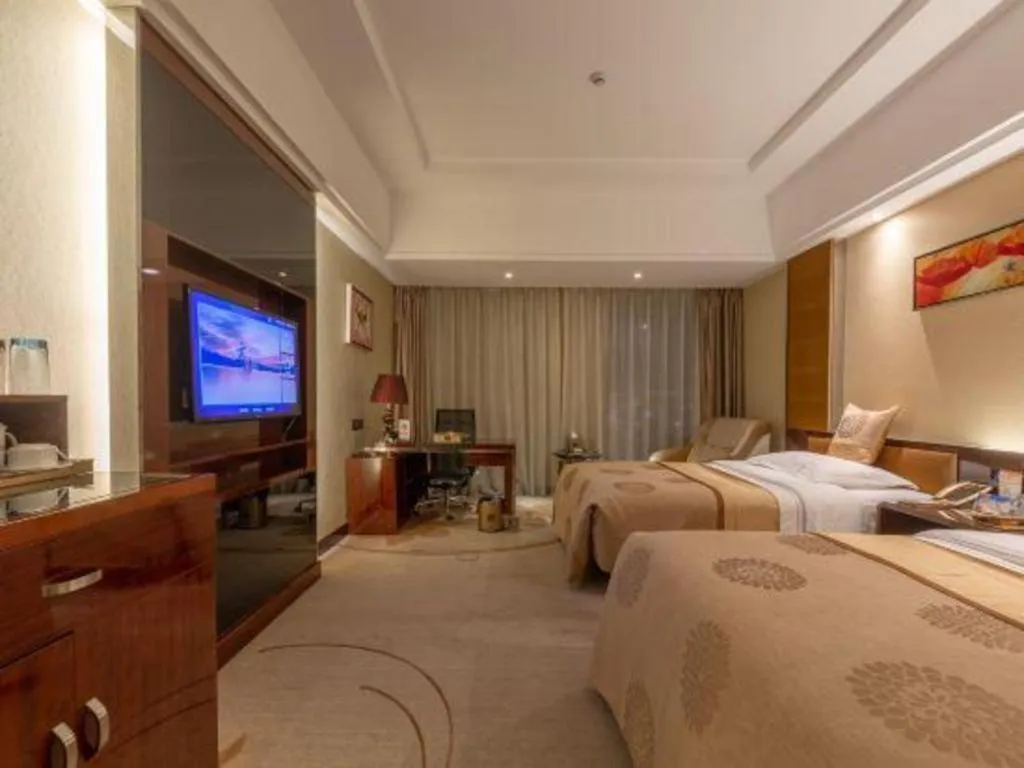 Bed in Xin Sheng Da Hong Sheng International Hotel