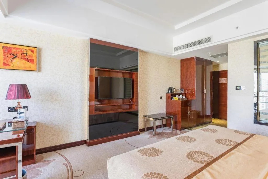 Bed in Xin Sheng Da Hong Sheng International Hotel