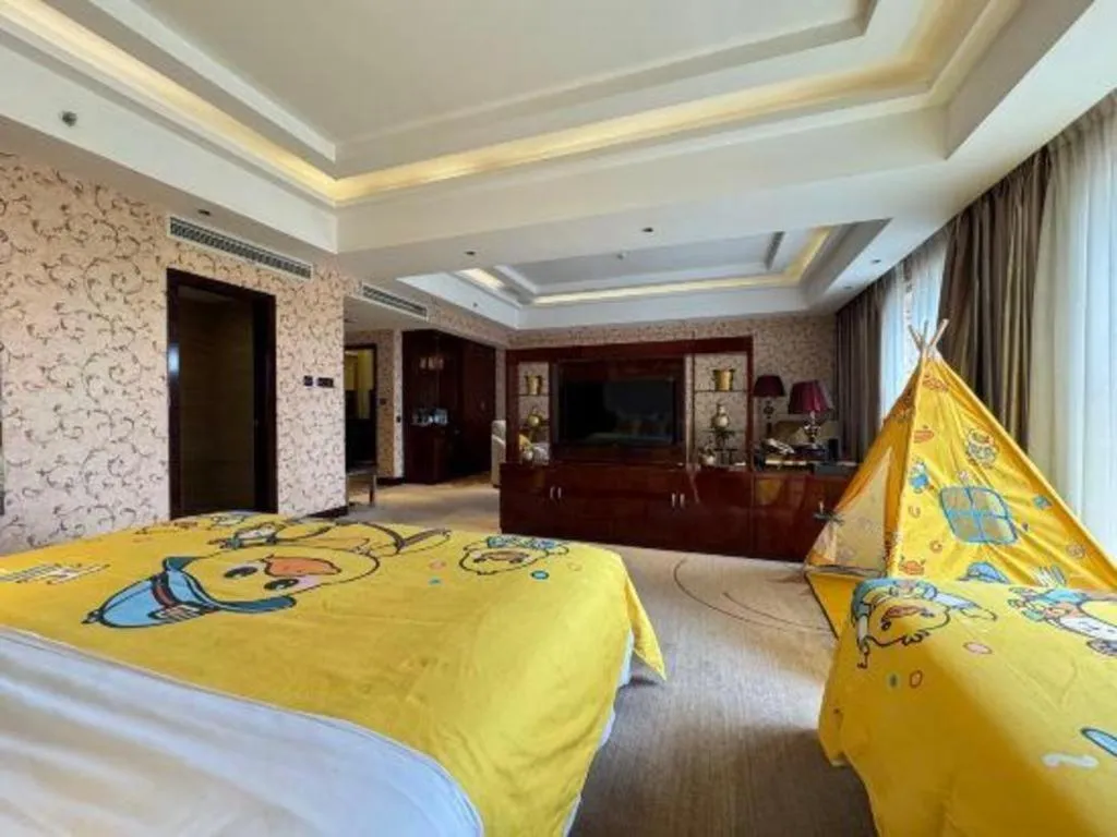 Bed in Xin Sheng Da Hong Sheng International Hotel