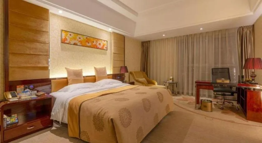 Bed in Xin Sheng Da Hong Sheng International Hotel