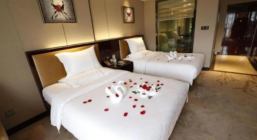 Bed in Xin Sheng Da Hong Sheng International Hotel