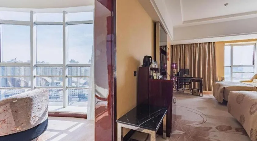 Bed in Xin Sheng Da Hong Sheng International Hotel