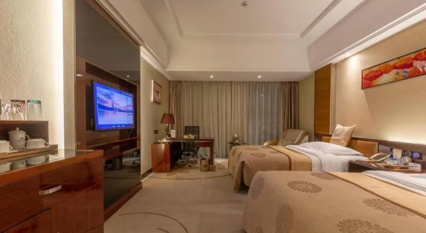 Bed in Xin Sheng Da Hong Sheng International Hotel