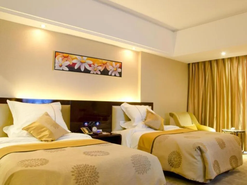 Bed in Xin Sheng Da Hong Sheng International Hotel
