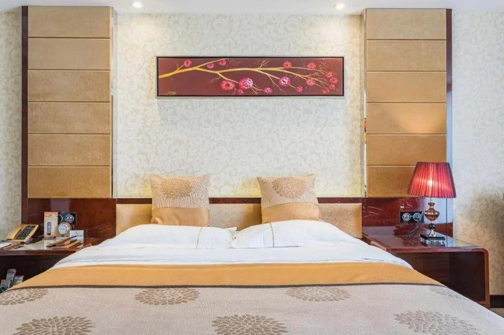 Bed in Xin Sheng Da Hong Sheng International Hotel