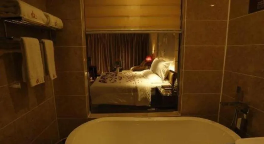 Bed in Xin Sheng Da Hong Sheng International Hotel