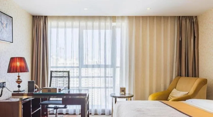 Bed in Xin Sheng Da Hong Sheng International Hotel