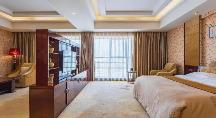 Bed in Xin Sheng Da Hong Sheng International Hotel