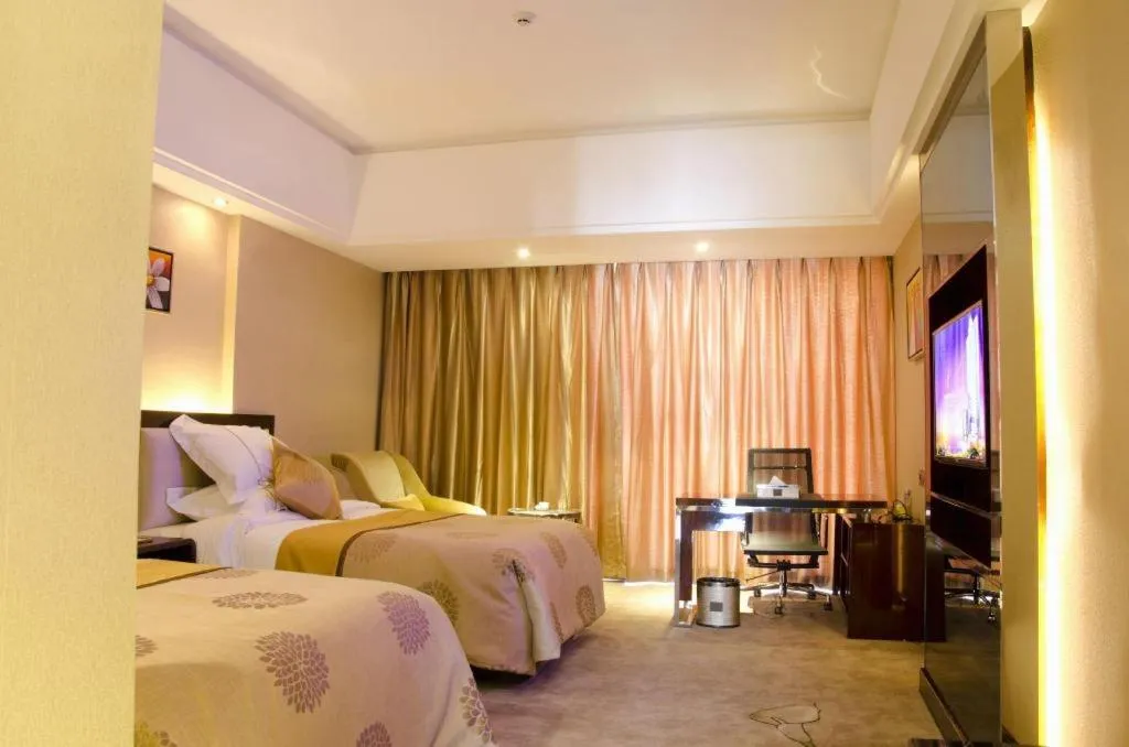 Bed in Xin Sheng Da Hong Sheng International Hotel