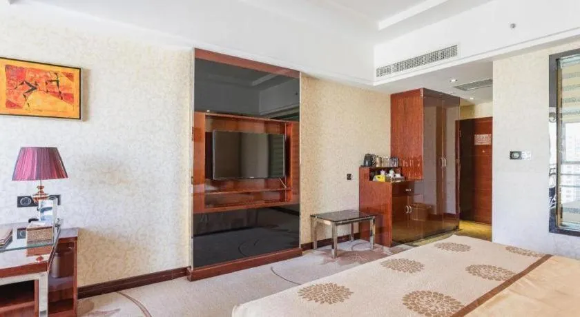 Bed in Xin Sheng Da Hong Sheng International Hotel