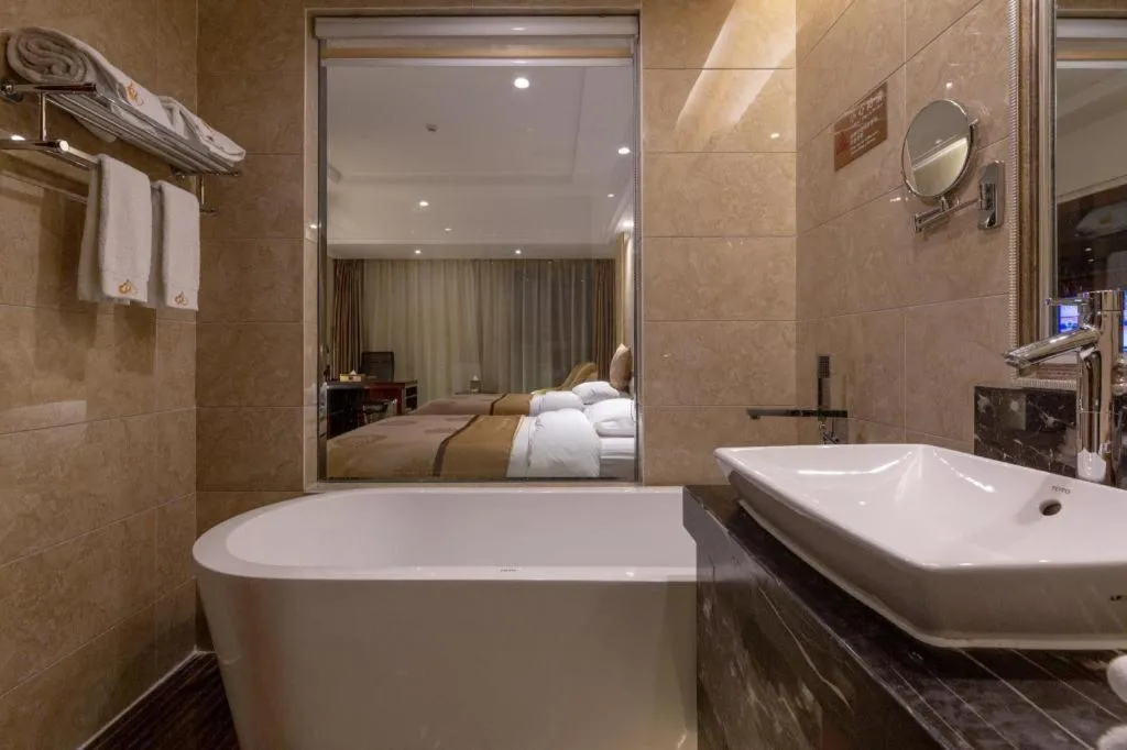 Bed in Xin Sheng Da Hong Sheng International Hotel