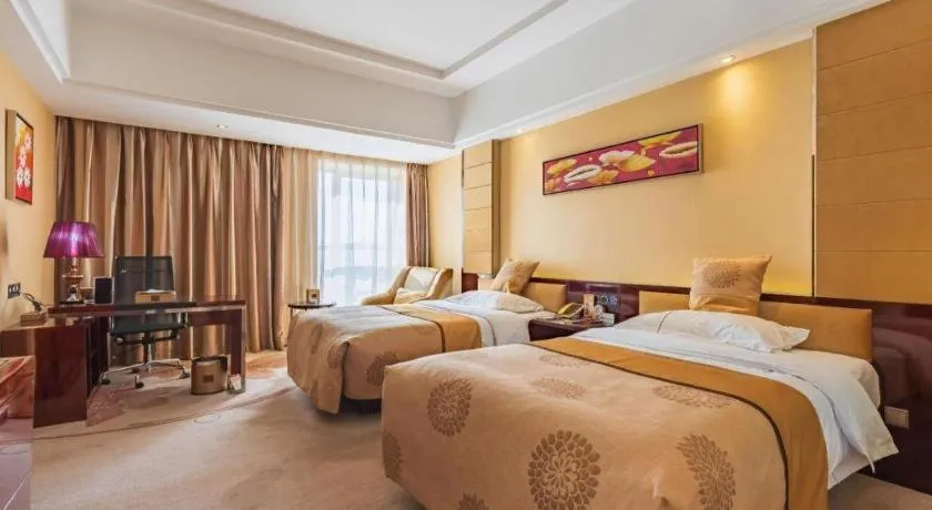 Bed in Xin Sheng Da Hong Sheng International Hotel