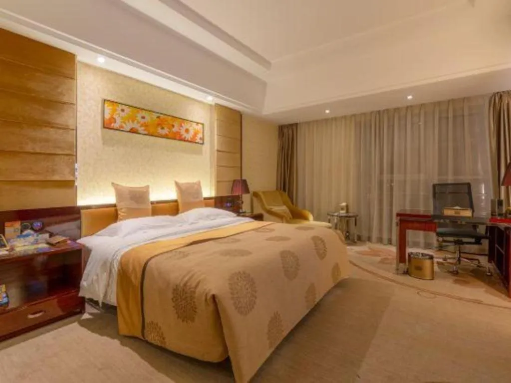 Bed in Xin Sheng Da Hong Sheng International Hotel