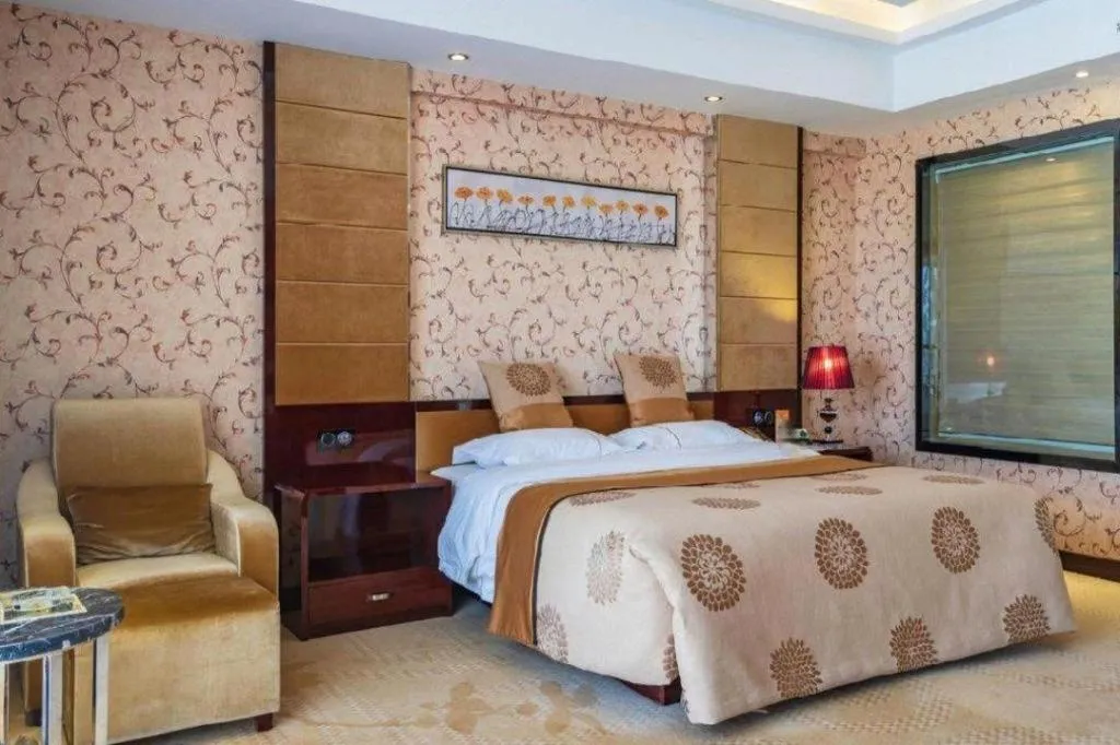 Bed in Xin Sheng Da Hong Sheng International Hotel