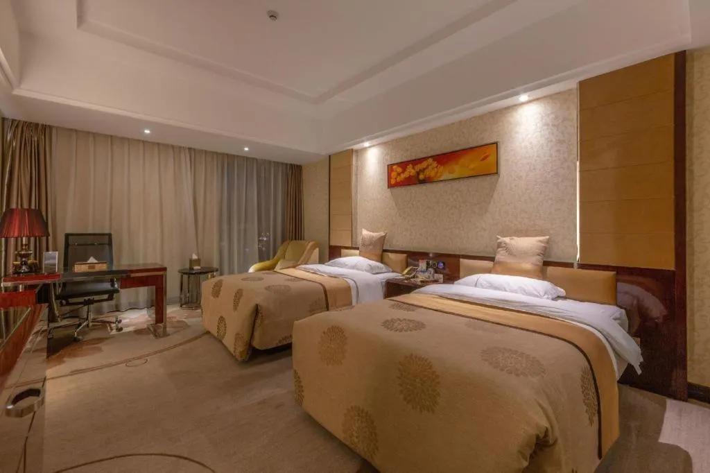 Bed in Xin Sheng Da Hong Sheng International Hotel
