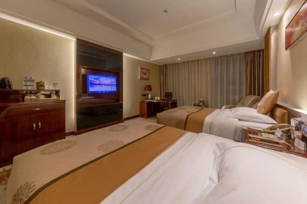 Bed in Xin Sheng Da Hong Sheng International Hotel